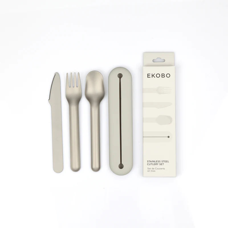 The Stainless Steel Cutlery Trio with Case Set of 2 by Ekobo includes a knife, fork, and spoon made from durable stainless steel, all neatly housed in a compact case marked with packaging code EKOB0. Displayed against a white background, this stylish and practical set is ideal for enjoying meals on the go while ensuring both convenience and lasting quality.