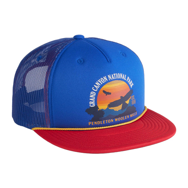 Blue and red cap with Grand Canyon National Park design on a light gray background