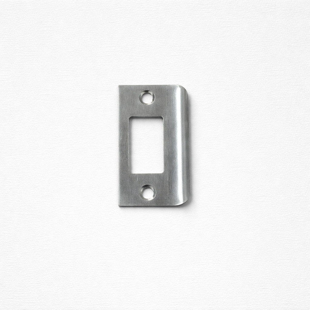 An Airstream Baldacci Door Handle Kit for Bathroom Door (Part # 382523, 454614), featuring a rectangular-opening strike plate with two screw holes, displayed on a white background.