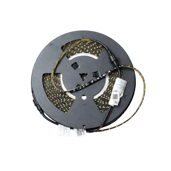 Spool of LED strip light on a white background