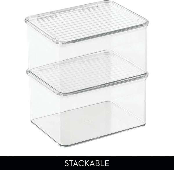 Two clear plastic stackable storage bins with ribbed lids, shown on a white background with a black bar at the bottom containing the word 'STACKABLE'.
