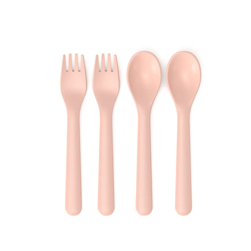 The Bamboo Reusable Cutlery Set Duos, Set of 2 by Ekobo is displayed on a white background, featuring four pale pink utensils: two forks on the left and two spoons on the right. Each utensil has a short, rounded handle and a sleek, modern design. Made from BPA-free bamboo eco-composite, this reusable set combines style and sustainability for your tableware collection.