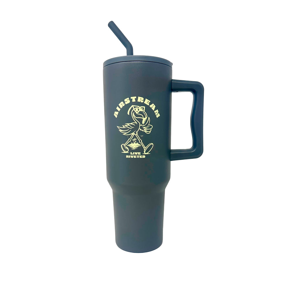 Stay refreshed on the go with the Airstream Live Riveted Flamingo Cartoon Tumbler—a tall, dark insulated travel cup featuring a convenient handle and attached straw. Adorned with a playful flamingo cartoon and printed with “AIRSTREAM” and “LIVE RIVETED” on the side, this tumbler is perfect for keeping your drinks hot or cold during all your adventures.