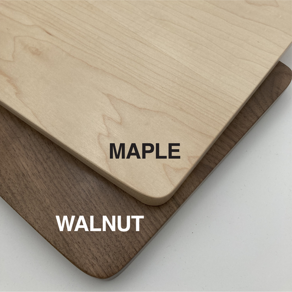 Two wooden boards labeled 'Maple' and 'Walnut' on a light gray background.