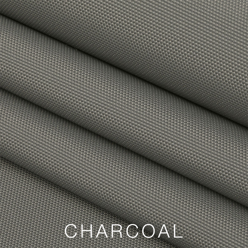 Close-up of folded, textured charcoal gray fabric with a subtle pattern, designed for use as the Airstream Travel Trailer Padded Solar Window Guard Protector. The word CHARCOAL is written at the bottom in white capital letters. #color_Gray