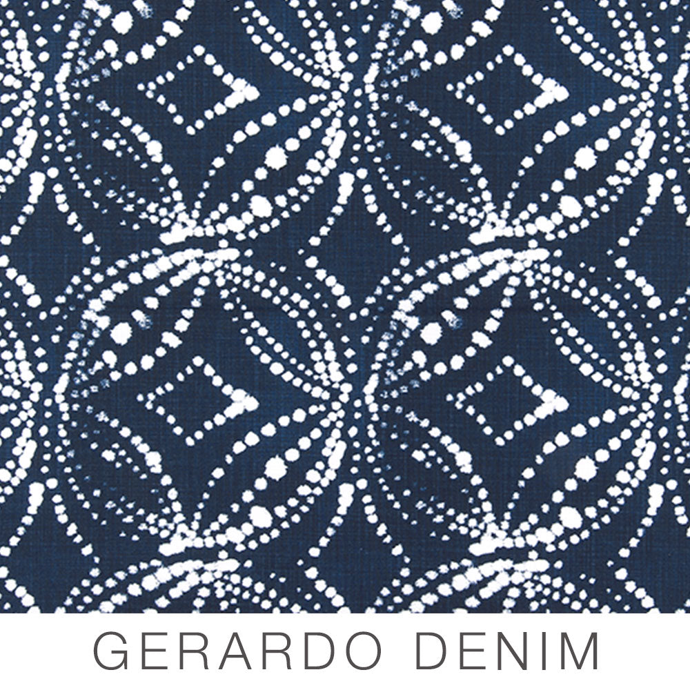 White dotted circular and floral patterns on a dark blue denim-like background evoke a chic yet cozy aesthetic, perfect for Airstream Printed Custom Curtains for Pottery Barn Travel Trailers. Text at the bottom reads GERARDO DENIM.