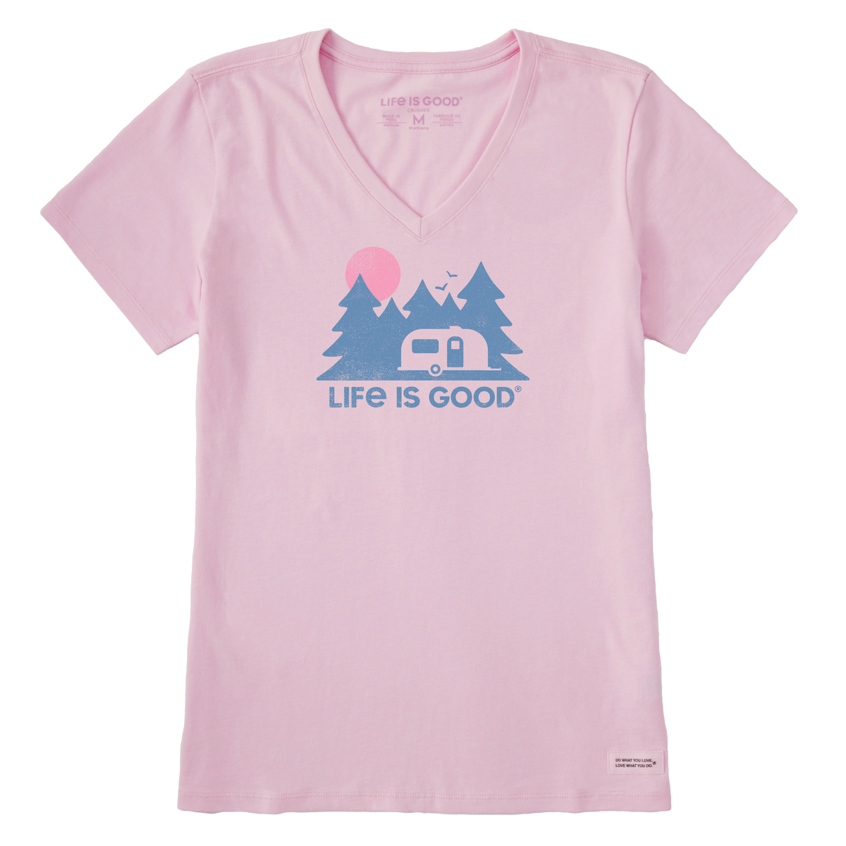 The Airstream Forest Crusher V-Neck T-Shirt by Life is Good® showcases a charming light pink design featuring trees, birds, a camper, and a pink sun above the words LIFE IS GOOD. This comfortable V-neck is perfect for anyone searching for their new favorite Life is Good shirt.