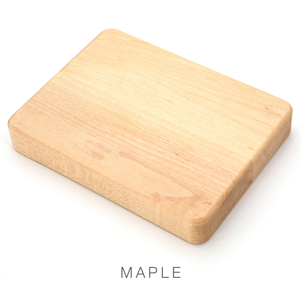A rectangular Airstream Wood Dinette Table Upgrade for International Travel Trailers, crafted from maple and featuring rounded edges, is displayed on a white background, highlighting craftsmanship reminiscent of a premium wood tabletop. The word “MAPLE” appears below the table.