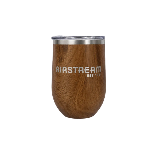 Airstream Woodgrain Wine Tumbler featuring a woodgrain finish, stemless design, and a clear lid.