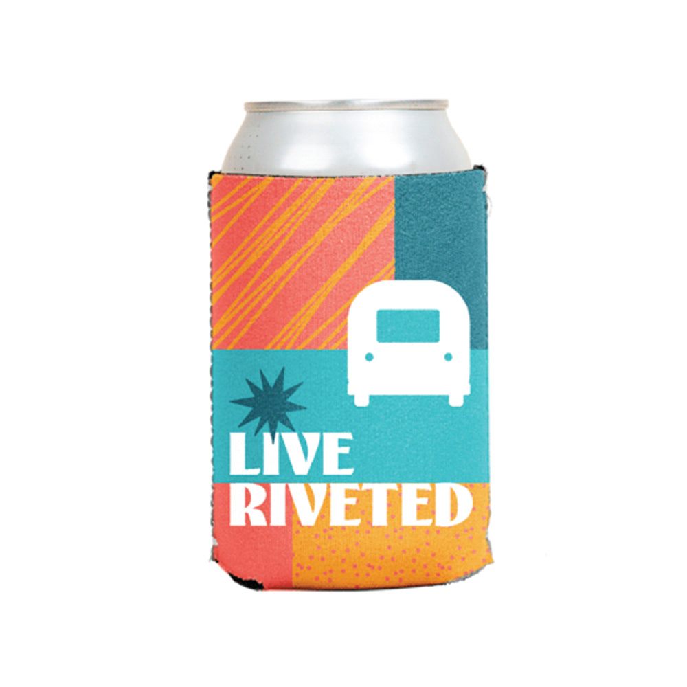 The Airstream Colorblock Live Riveted Can Cooler is a vibrant neoprene sleeve featuring colorful stripes, a camper icon, a starburst, and the phrase “LIVE RIVETED” in bold white letters on a teal, orange, and yellow background.