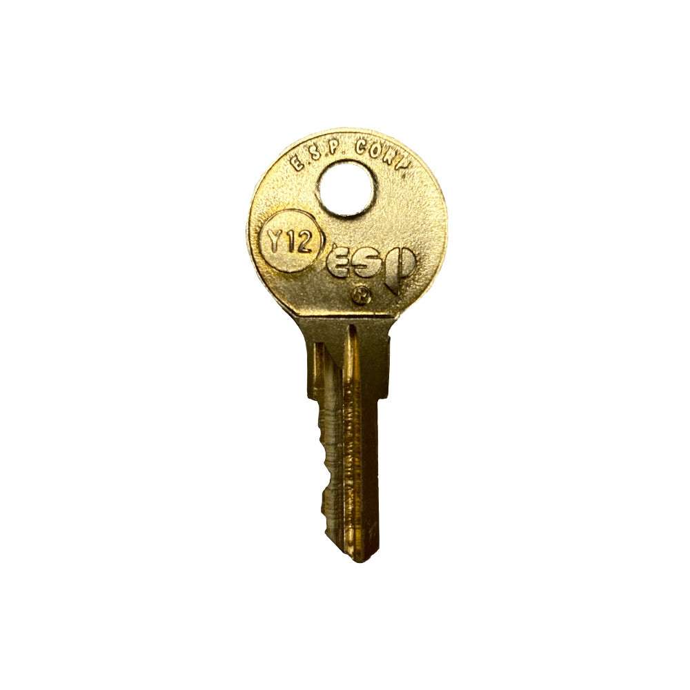 Airstream Compartment Door Pre-Cut Key—a brass house key with a round head, marked Y12 and ESP on the top, isolated on a white background; perfect as an Airstream compartment door key or replacement key blank.