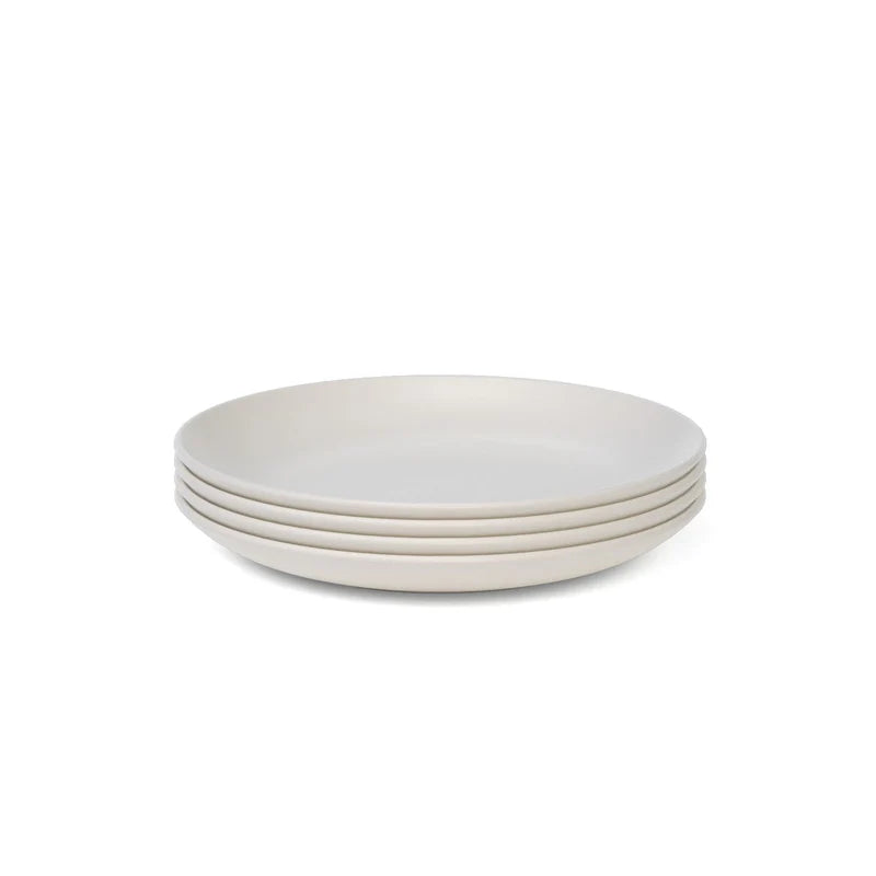 The Bamboo Round Plate Set of 4 by Ekobo features four round, plain white plates crafted from bamboo eco-composite, beautifully displayed on a white background for an elegant and sustainable upgrade to your reusable tableware collection.