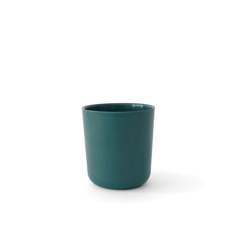 A set of four 12 oz Bamboo Cups from Ekobo is centered on a white background, embodying the elegance often found in sustainable dining products.