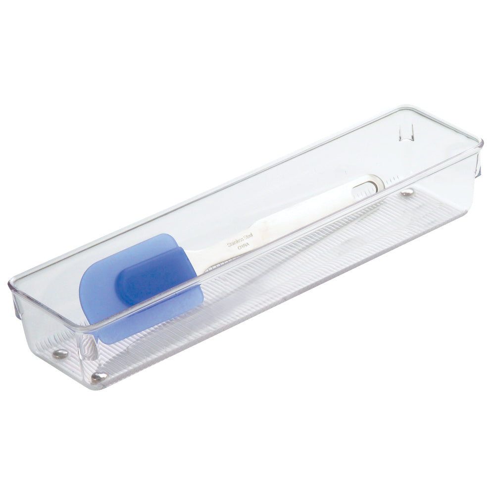 A clear, rectangular Organizer 12 x 3 x 2 tray with small ridges on the bottom and rounded corners holds a blue silicone spatula with a white handle, making it perfect as a slim organizer for your storage essentials.