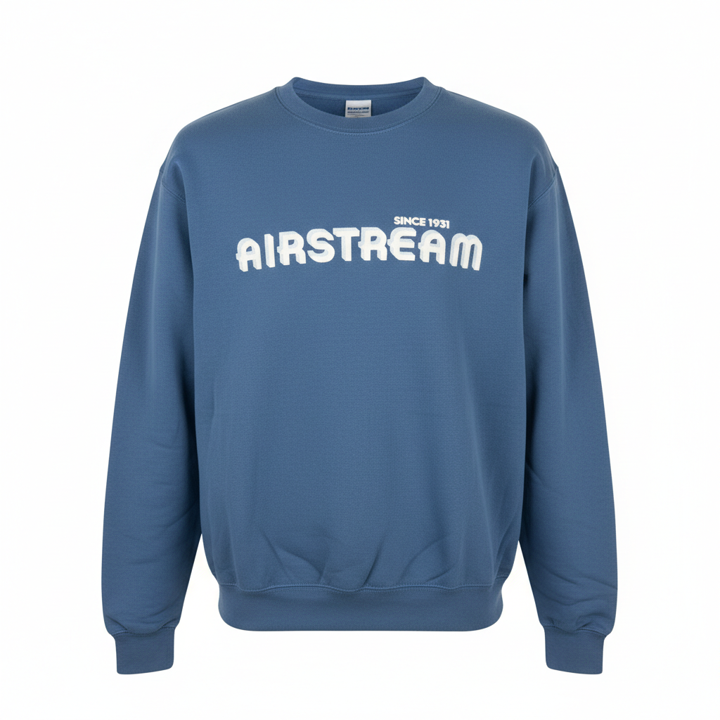 Airstream 1931 Series Sweatshirt in vintage blue, featuring “AIRSTREAM SINCE 1931” printed in bold, rounded white letters across the chest. This classic comfort sweatshirt is shown against a white background.