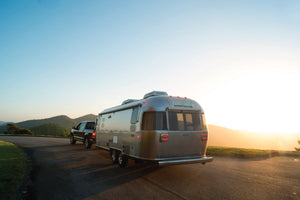 Driving with Airstream Trailer Through Mist