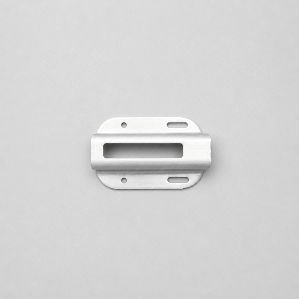 Metallic bracket on a gray background