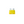 Yellow automotive fuse on a white background