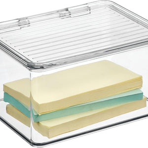 Clear plastic storage box with a slotted lid, shown on a white background with two stacks of sticky notes inside.
