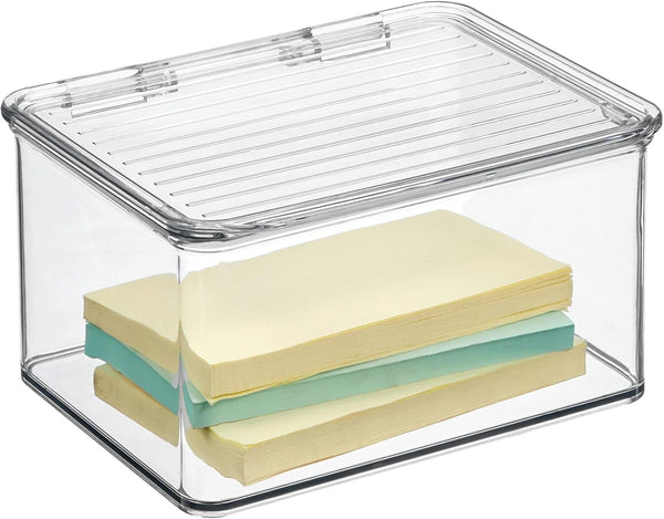 Clear plastic storage box with a slotted lid, shown on a white background with two stacks of sticky notes inside.