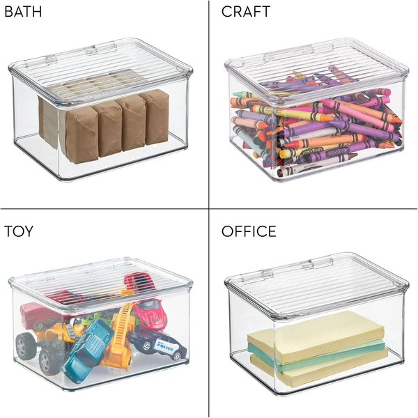 Four clear plastic storage bins arranged in a 2x2 grid on a white background, labeled for use in BATH, CRAFT, TOY, and OFFICE. The bins have transparent lids with vented slits and are shown storing paper towels, crayons, toy vehicles, and sticky notes respectively.