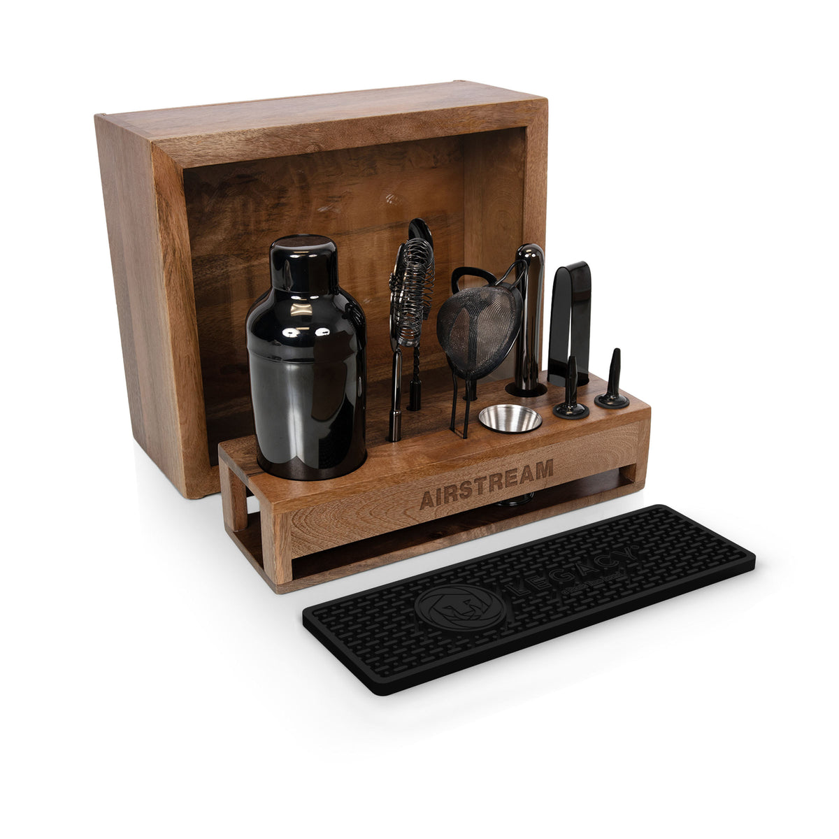 The Airstream Old Fashioned Bar Set features an array of wooden-handled bar tools—including a shaker, strainer, spoon, tongs, measuring jigger, and more—all presented in a stylish wooden case branded with “AIRSTREAM.” The set comes with a sleek black bar mat and is the perfect eco-conscious cocktail kit for your home bar.