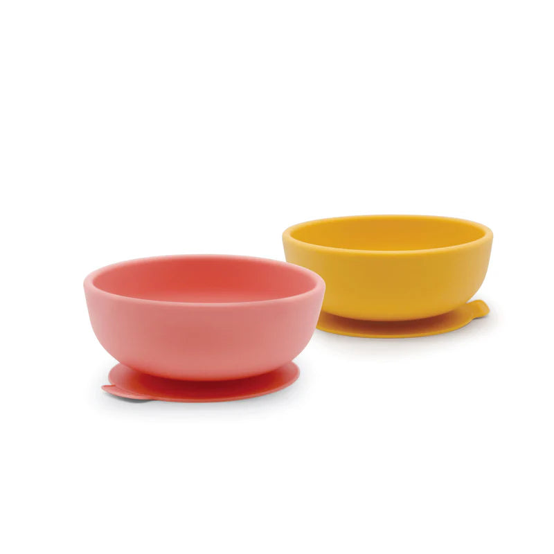 The Silicone Suction Bowl Set for Kids by Ekobo features a pink and a yellow bowl, designed for toddler feeding, displayed side by side on a white background.