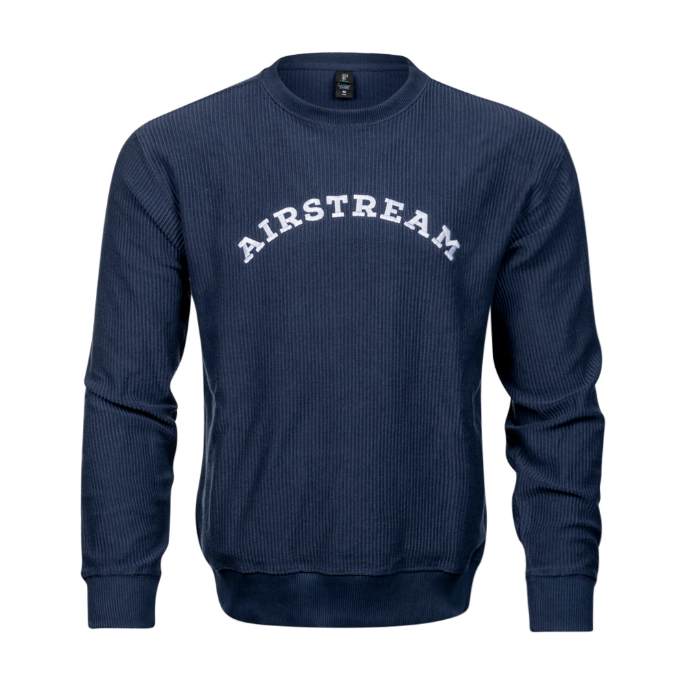 Introducing the Airstream Heritage Arc Corded Sweatshirt – a navy blue ribbed crewneck featuring “AIRSTREAM” printed in bold white lettering, arched across the chest. This classic sweatshirt has long sleeves and a clean, pattern-free design, making it a timeless piece perfect for vintage camper enthusiasts.