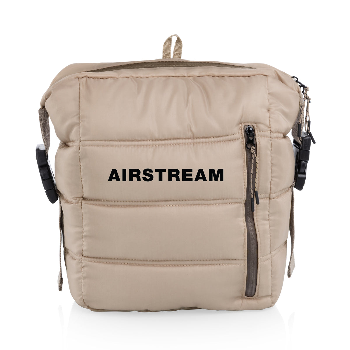 The Airstream Adventure Cooler Backpack is a beige, padded insulated backpack featuring black “AIRSTREAM” text, a front zipper pocket, and side buckles, shown standing upright on a white background.