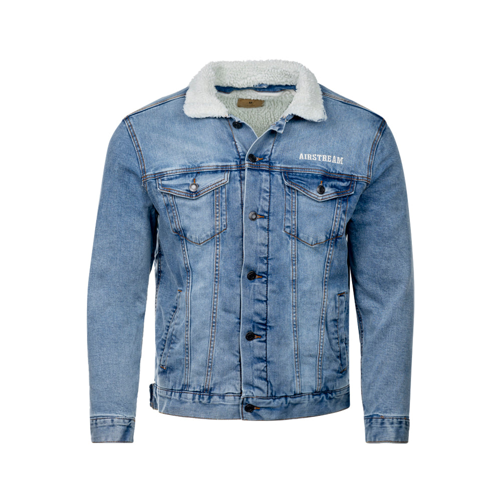 The Utility No.31 Sherpa Denim Jacket showcases a light blue denim exterior with a soft white sherpa collar, button-front closure, and four functional front pockets. Bold AIRSTREAM lettering is displayed on the left chest. Ideal for outdoor adventures, this durable jacket is presented against a white background.
