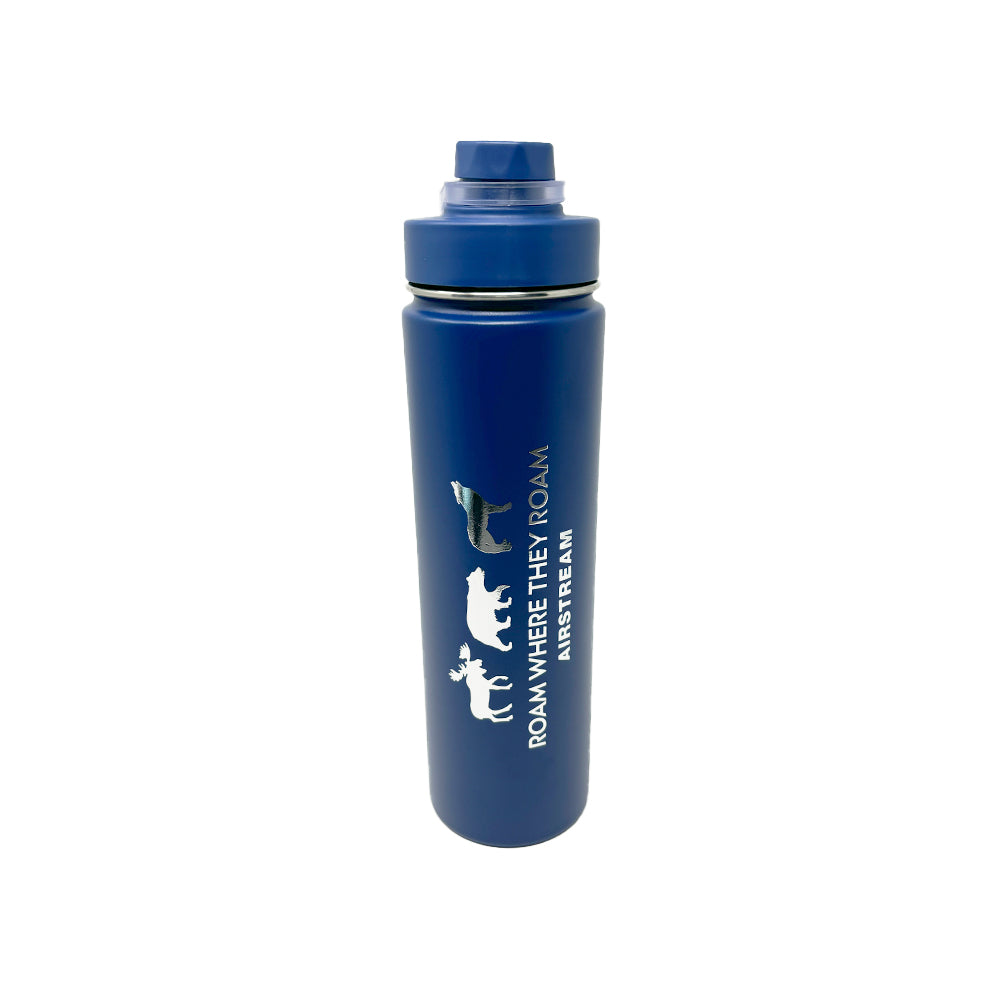 Introducing the Airstream Roam Where They Roam Water Bottle—a durable blue bottle adorned with animal silhouettes (moose, bear, wolf, eagle) and the words “ROAM WHERE THEY ROAM” along with “AIRSTREAM” printed vertically on the side. Perfect for any adventure.