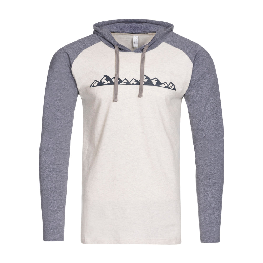 The Airstream Horizons Mountain Colorblock Long Sleeve Hooded T-Shirt features a white body with gray sleeves, a comfortable long-sleeve design, and a bold black mountain graphic across the chest—perfect for outdoor adventures or relaxing by your Airstream Horizons.