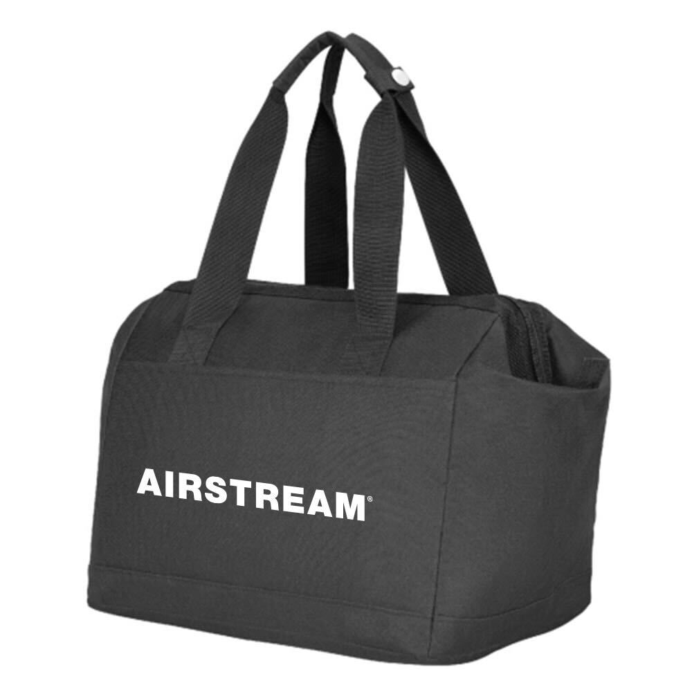 Introducing the Airstream Gear Bag—a black duffel with two handles and a zipper closure, boldly displaying “AIRSTREAM” in white letters across the front. Made from recycled PET fabric, this eco-friendly travel companion is perfect for your next adventure.