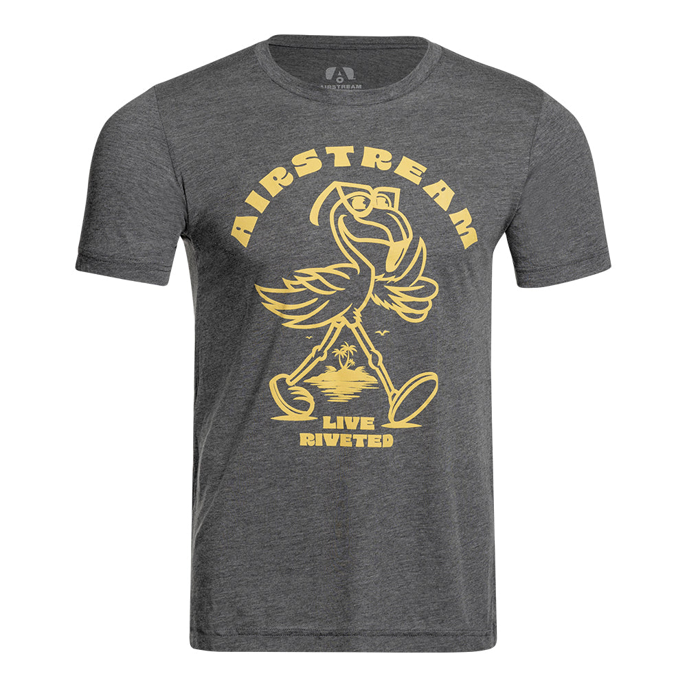 The Airstream Live Riveted Flamingo Cartoon T-Shirt showcases a cheerful yellow flamingo cartoon, happily walking and smiling. Capturing the spirit of the Riveted Airstream style, this gray tee features “AIRSTREAM” above and “LIVE RIVETED” below the playful flamingo, set against a backdrop of sun rays and palm trees.