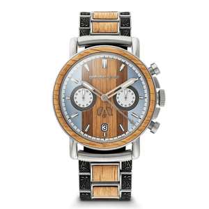 A luxury chronograph watch by Originally Chari, featuring a round wood-grain dial, a light blue sub-dial face, and a two-tone stainless steel and wood link bracelet on a white background.