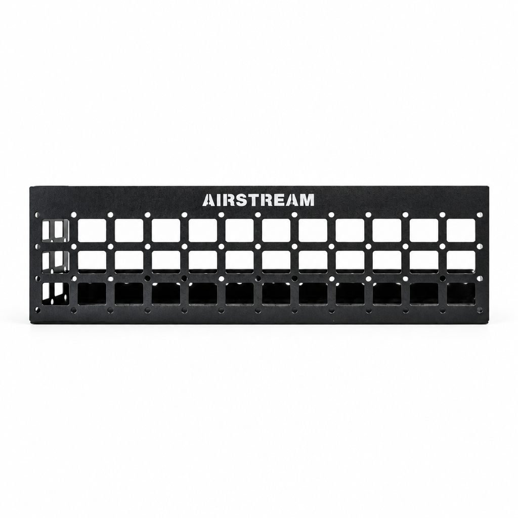Black metal Airstream Molle Panel Accessories for Rangeline storage rack featuring a grid of square cutouts and the text AIRSTREAM printed on the front panel.