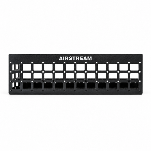 Black metal Airstream Molle Panel Accessories for Rangeline storage rack featuring a grid of square cutouts and the text AIRSTREAM printed on the front panel.