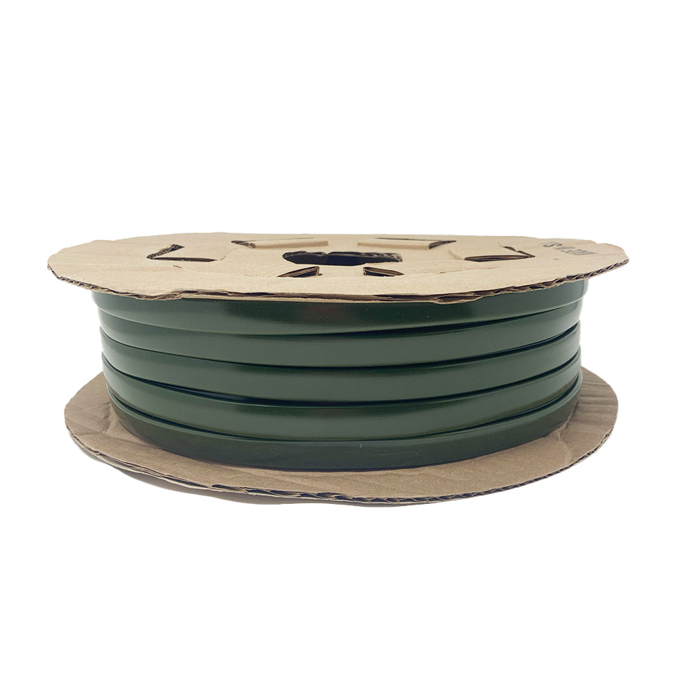 Airstream Premium Replacement Belt Trim for Travel Trailers—a cardboard spool with several coils of dark green plastic strapping, shown on a white background—ideal for use as aluminum Airstream trim or as a high-quality replacement belt trim for your Airstream exterior accessory projects.