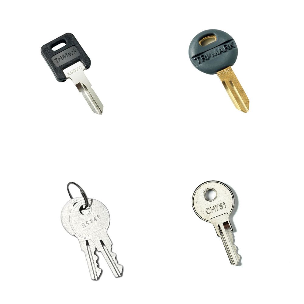 Four distinct keys are pictured: two plastic-headed keys at the top and two sets of metal keys at the bottom, with one keyring holding a pair of keys. Each key is individually photographed on a white background, clearly displaying the Airstream Cut Key Bundle for Bambi Travel Trailers—an ideal solution for anyone needing pre-cut spare or replacement keys for their Airstream Bambi.