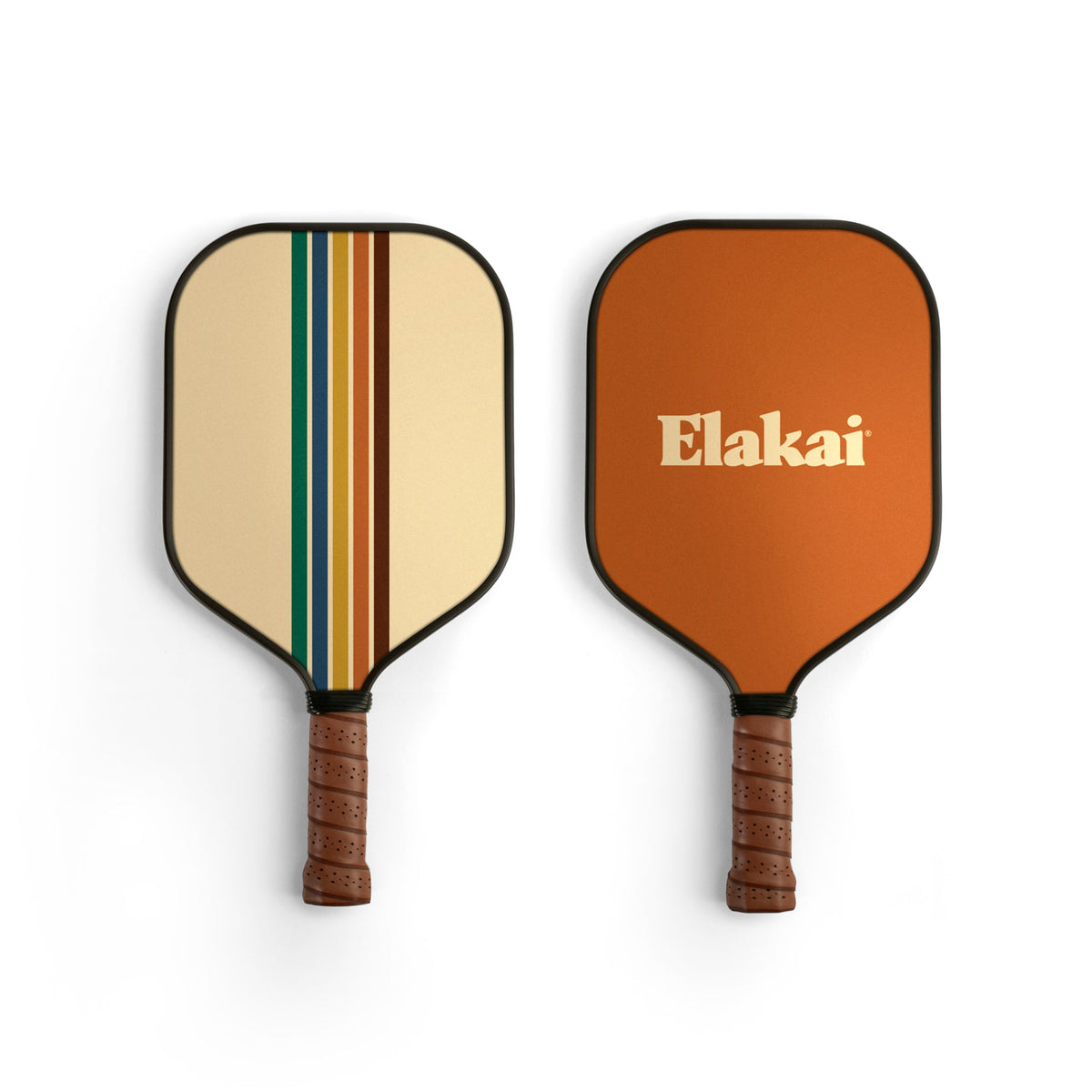 Two pickleball paddles with brown grips are displayed from above on a white background. The 16MM Retro Stripes Pickleball Paddle features a tan face with colorful vertical stripes, while the other paddle is solid orange and boldly displays “Elakai” in large letters. Both Elakai Pickleball Paddles combine eye-catching design with high-performance materials for an elevated game experience.