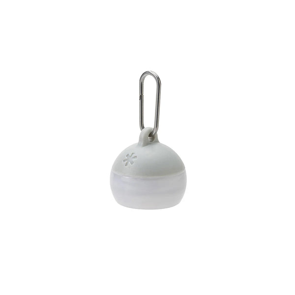 Cross-shaped pendant with blue stones on a silver chain against a white background
