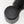 Close-up of a black plastic component with 'EV' branding on a white background