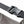 Close-up of a black belt with a plastic buckle on a white background