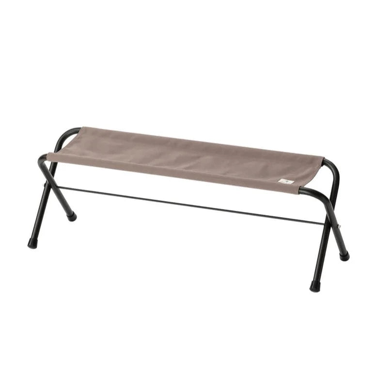 The Snow Peak Folding Grey Bench features a brown fabric seat and sturdy black aluminum legs, displayed against a white background—making it an ideal camp essential for both comfort and convenience.