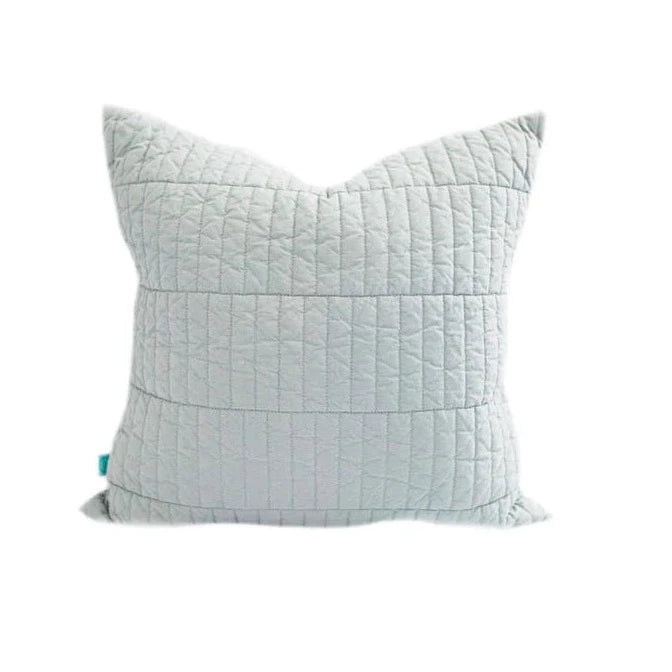 The Harper Medium Pillow Cover by Beddy’s is a light gray quilted decorative throw pillow cover featuring a subtle grid pattern, shown against a white background.