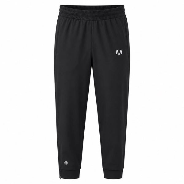 Black jogger sweatpants with an elastic waistband, ribbed ankle cuffs, and a small white circular logo on the left thigh and lower leg.