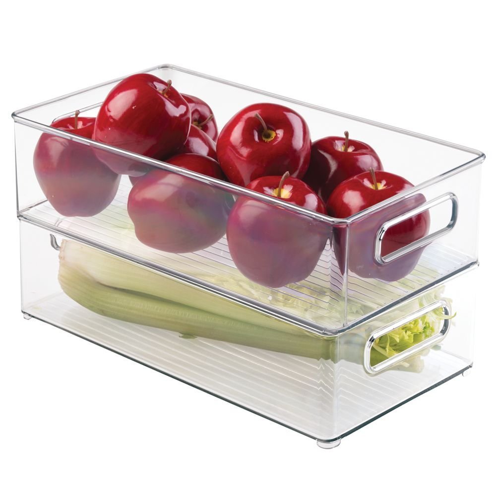 The Stackable Fridge/Pantry Bin (14 x 8 x 4) features two compartments: the top section neatly holds several red apples, while the bottom section stores a head of celery. Both sections are designed with side handles, making this heavy-duty bin perfect for organized Airstream storage or home use.