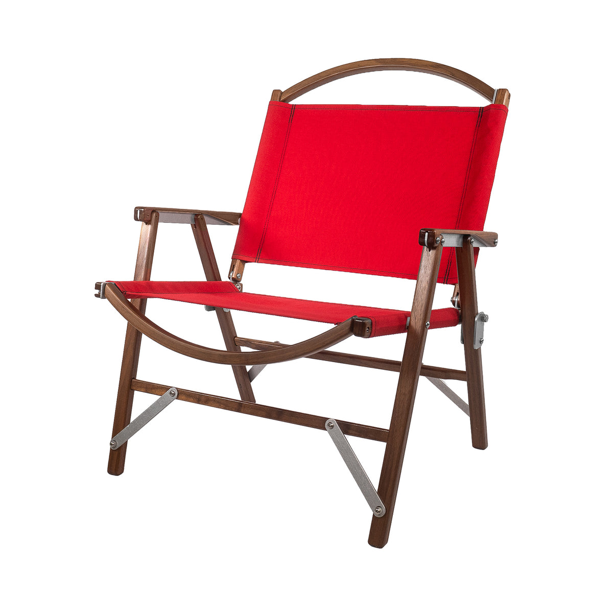 The Classic Walnut Chair by Kermit Chair Company is a wooden folding chair featuring a red fabric seat and backrest, crafted with simple, clean lines and reinforced with metal brackets—making this foldable chair ideal for outdoor adventures.