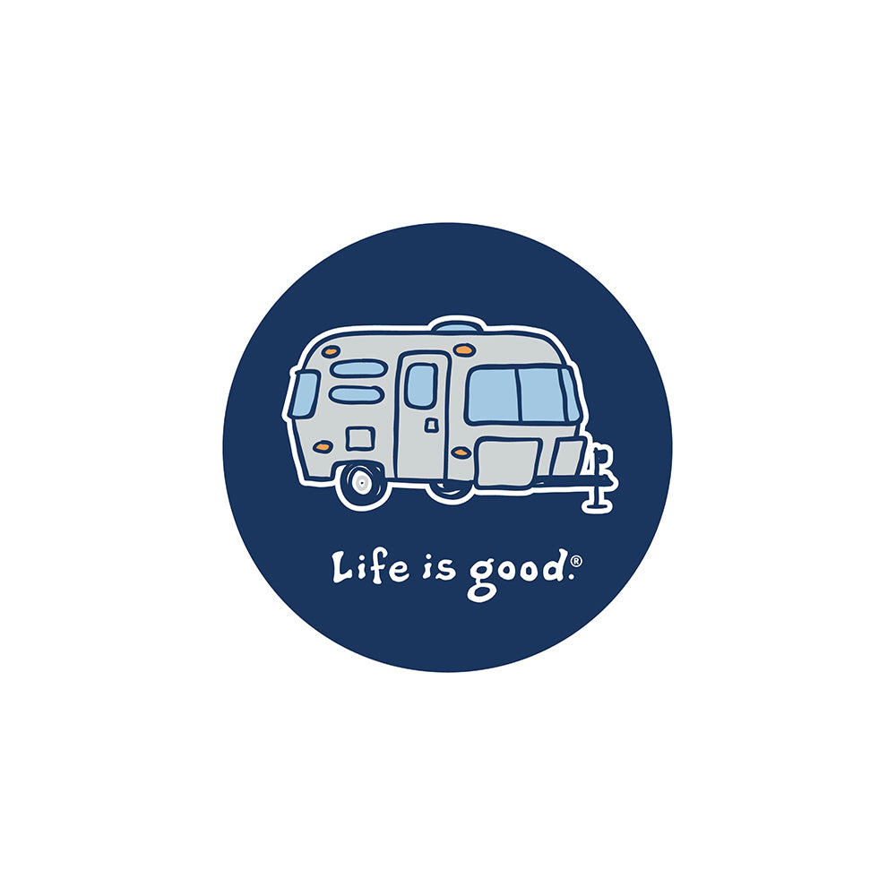 The Life is Good® Camper Sticker showcases a round navy blue logo with a minimal camper van illustration and the phrase “Life is good.” in a playful white font—an ideal accessory for Airstreams or any adventure on the road.