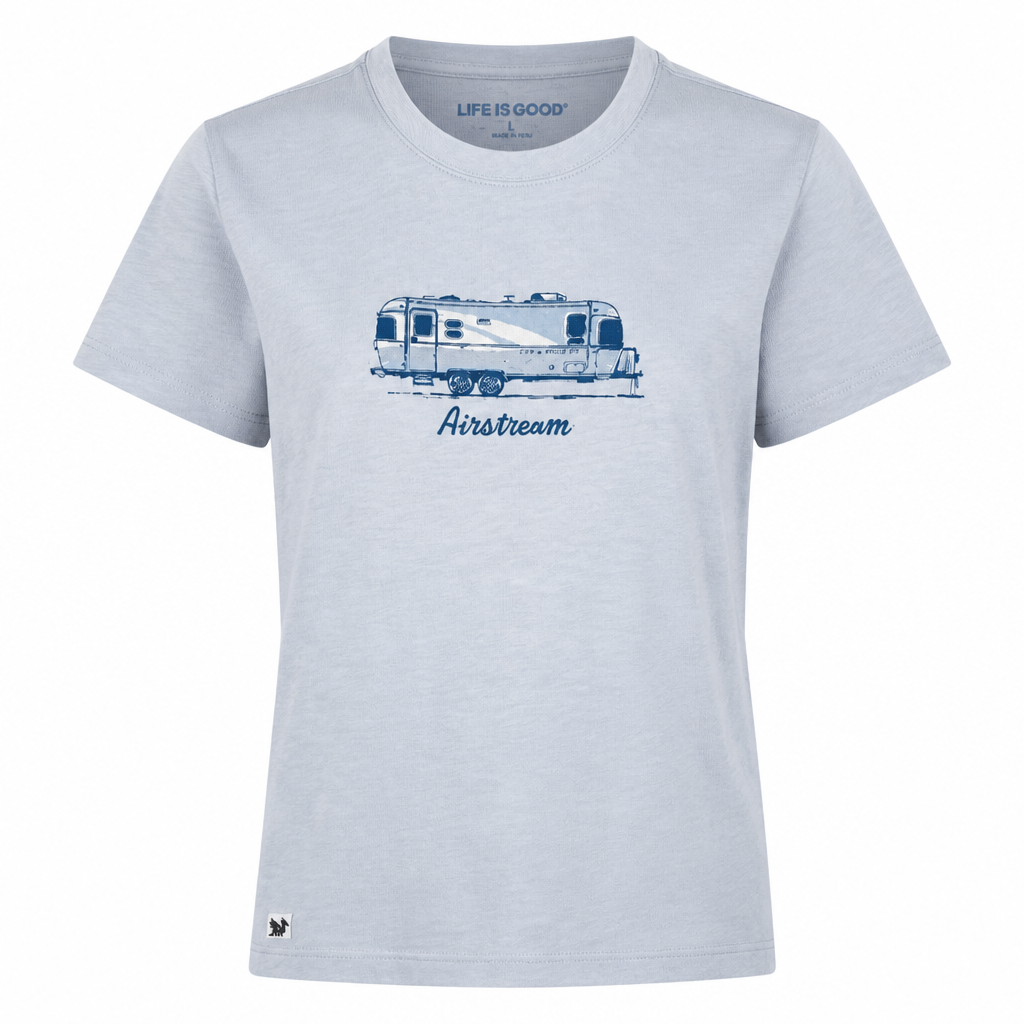 The Airstream Script Modern Camper Crusher T-Shirt by Life is Good® is a light gray cotton tee featuring a blue sketch of an Airstream camper with the word “Airstream” beneath—perfect for RV enthusiasts. The phrase “Life Is Good” is printed on the inside collar.